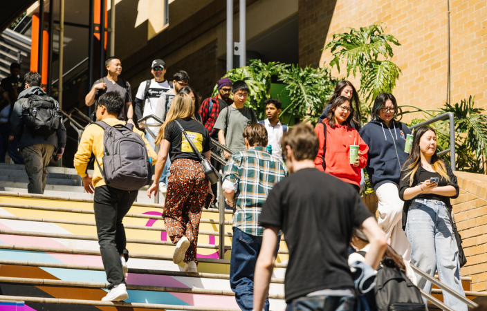 UNSW students walking up and down the stairs at the Diversity Festival 2024