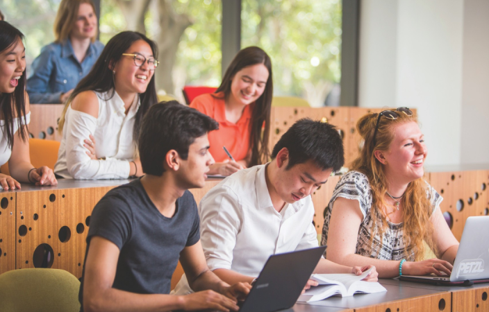 Students smiling in class UNSW