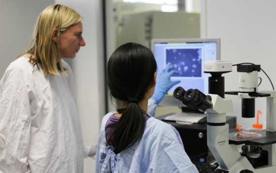 Teacher with student in lab