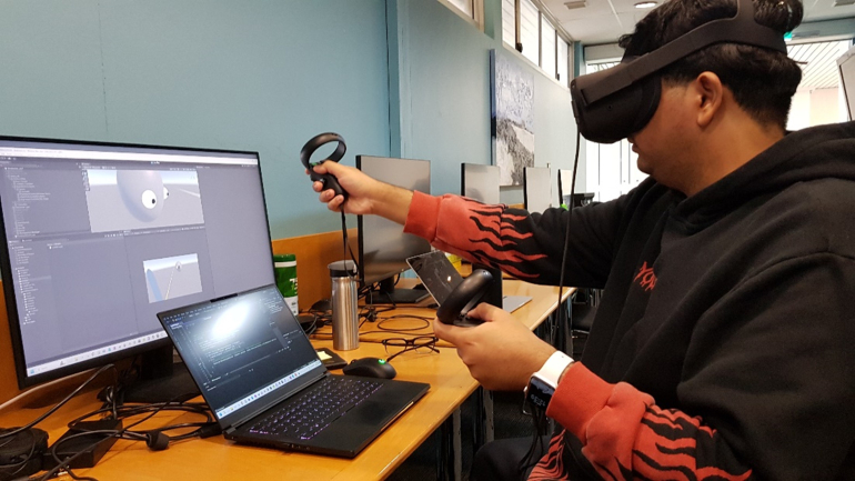 UNSW student Avi working on the VR Strabismus Simulation for Optometry for his WIL placement