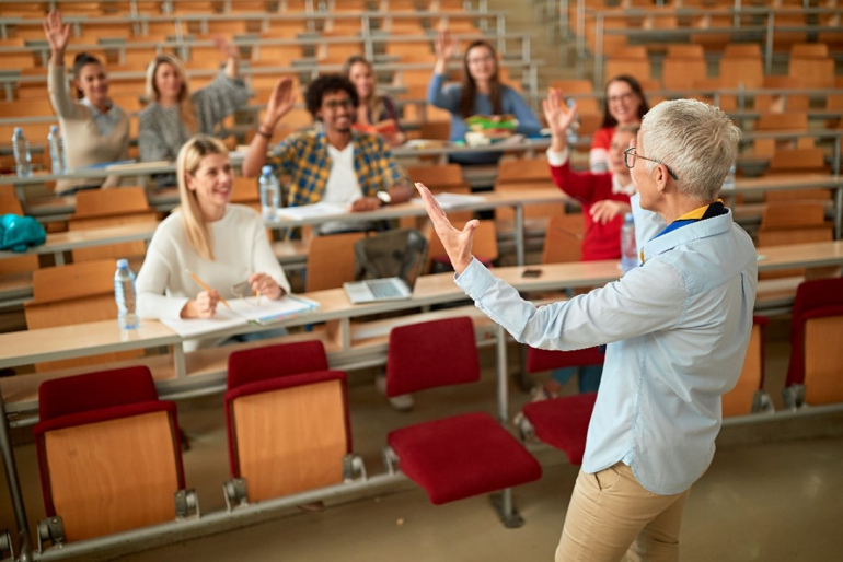 Teacher teaching to classrom