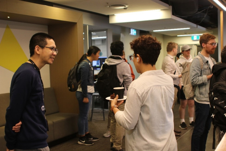 Participants chatting at the Peer Learning Festival Photo