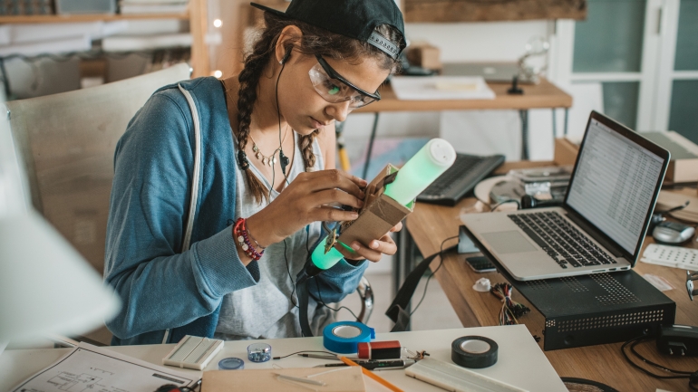 Teenage student working on engineering project