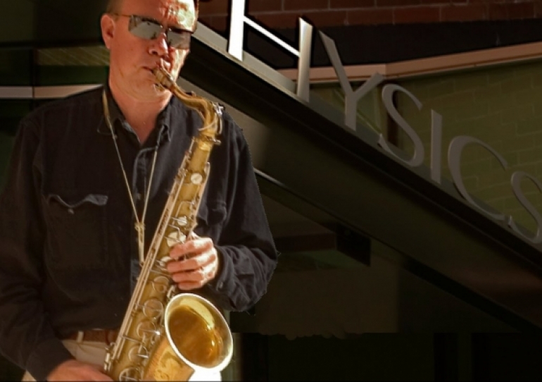 Joe Wolfe plays saxophone