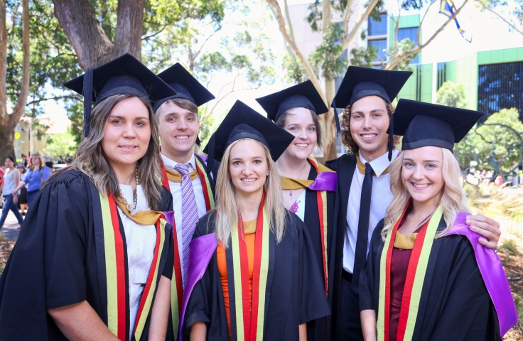 Graduating UNSW students in gap and gown