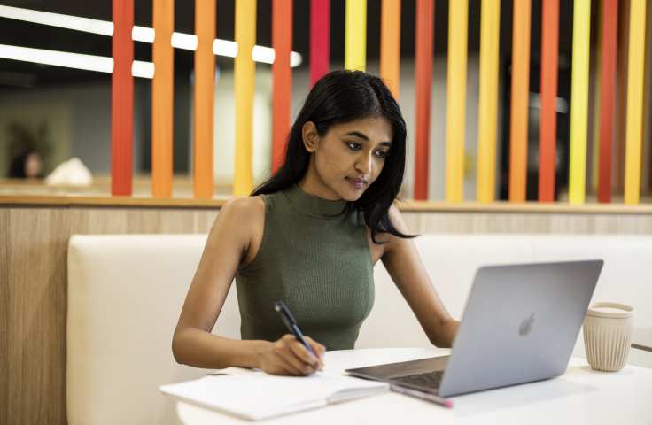 Student looking at a laptop