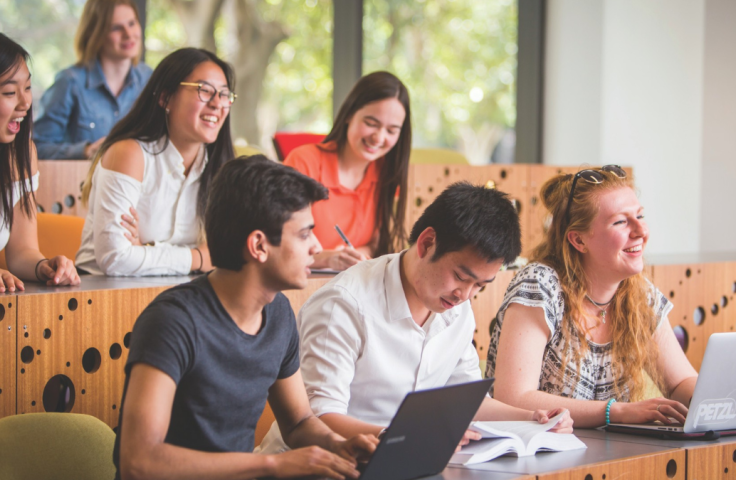 Smiling students in class UNSW