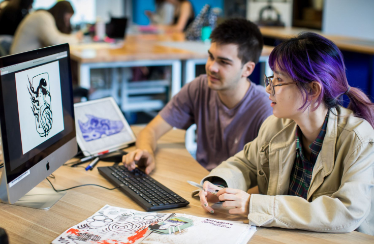 students designing on computer