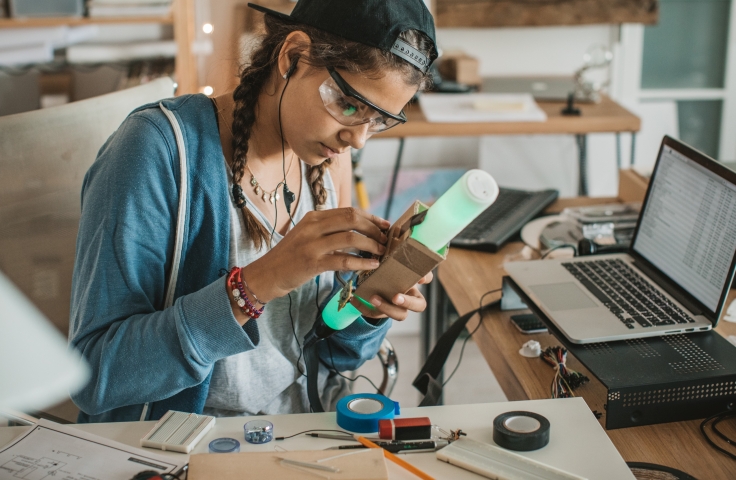 Teenage student working on engineering project