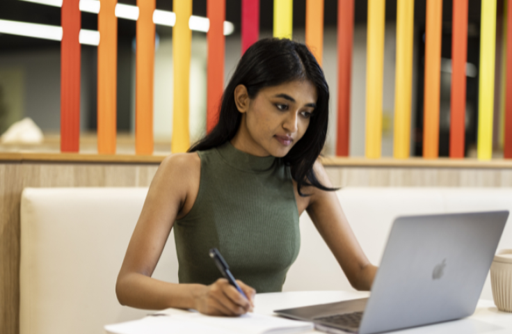 Student looking at laptop